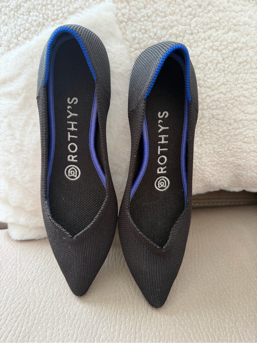 Rothy's Pointed Ballet Flats in Black with Blue Trim
